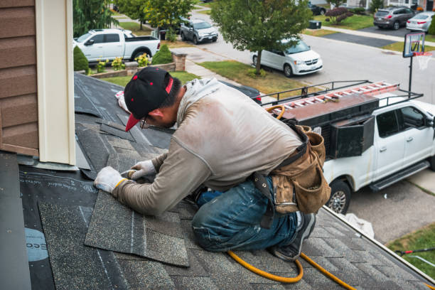Professional Gutter Installation technician working in Ludington, MI